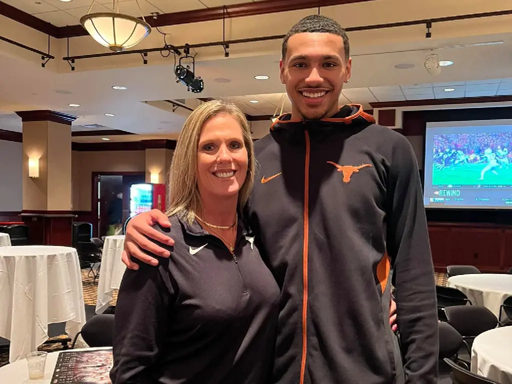 Michelle and Dylan donning Texas Longhorns logoed attire in November 2021