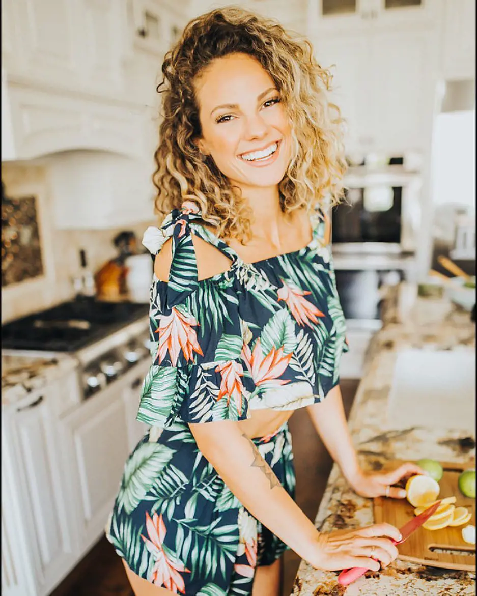 Miller chopping veggies in her kitchen in Tampa Bay