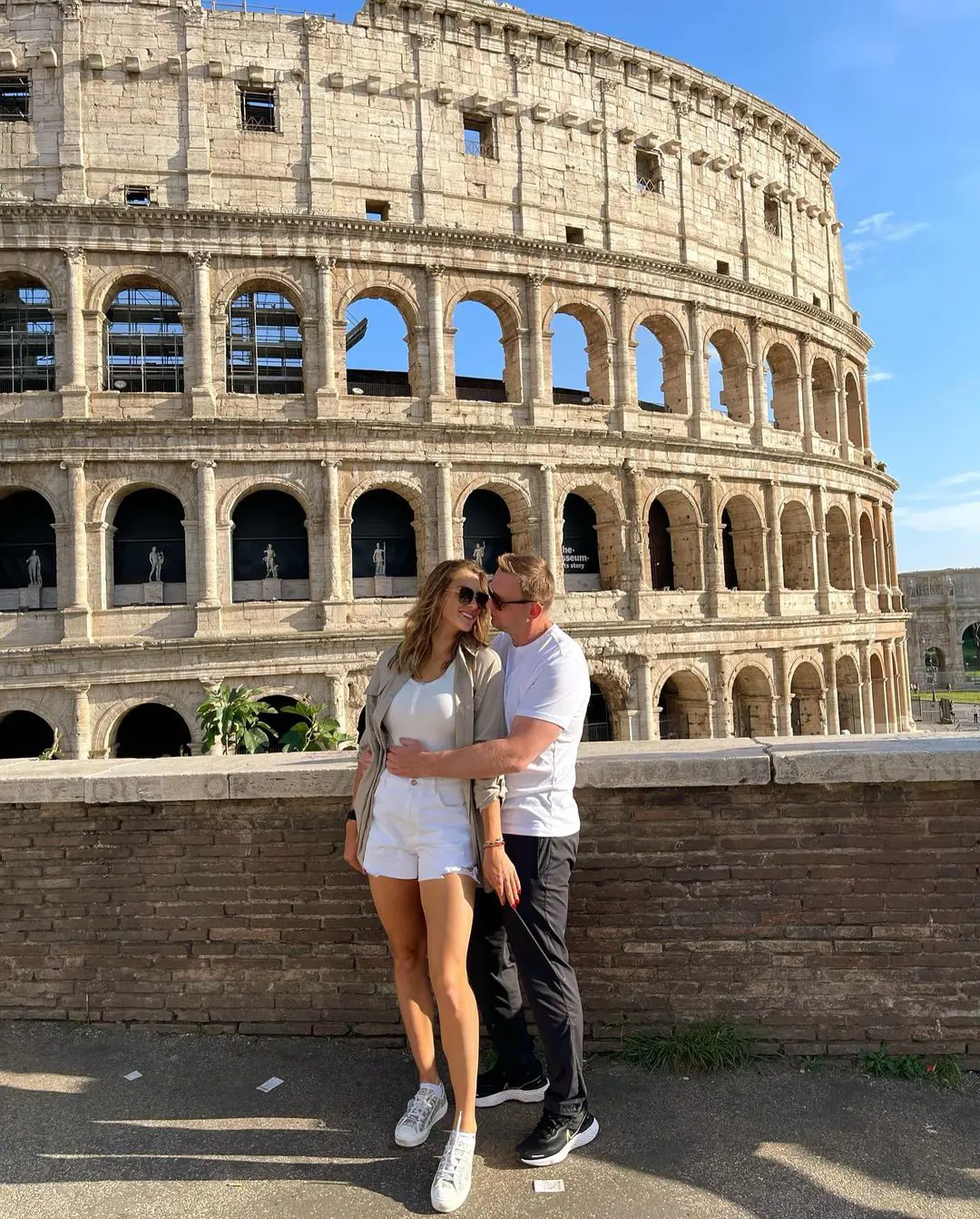 Aryna and Konstantin posing in front of The Colosseum in Rome, Italy in May 2022 